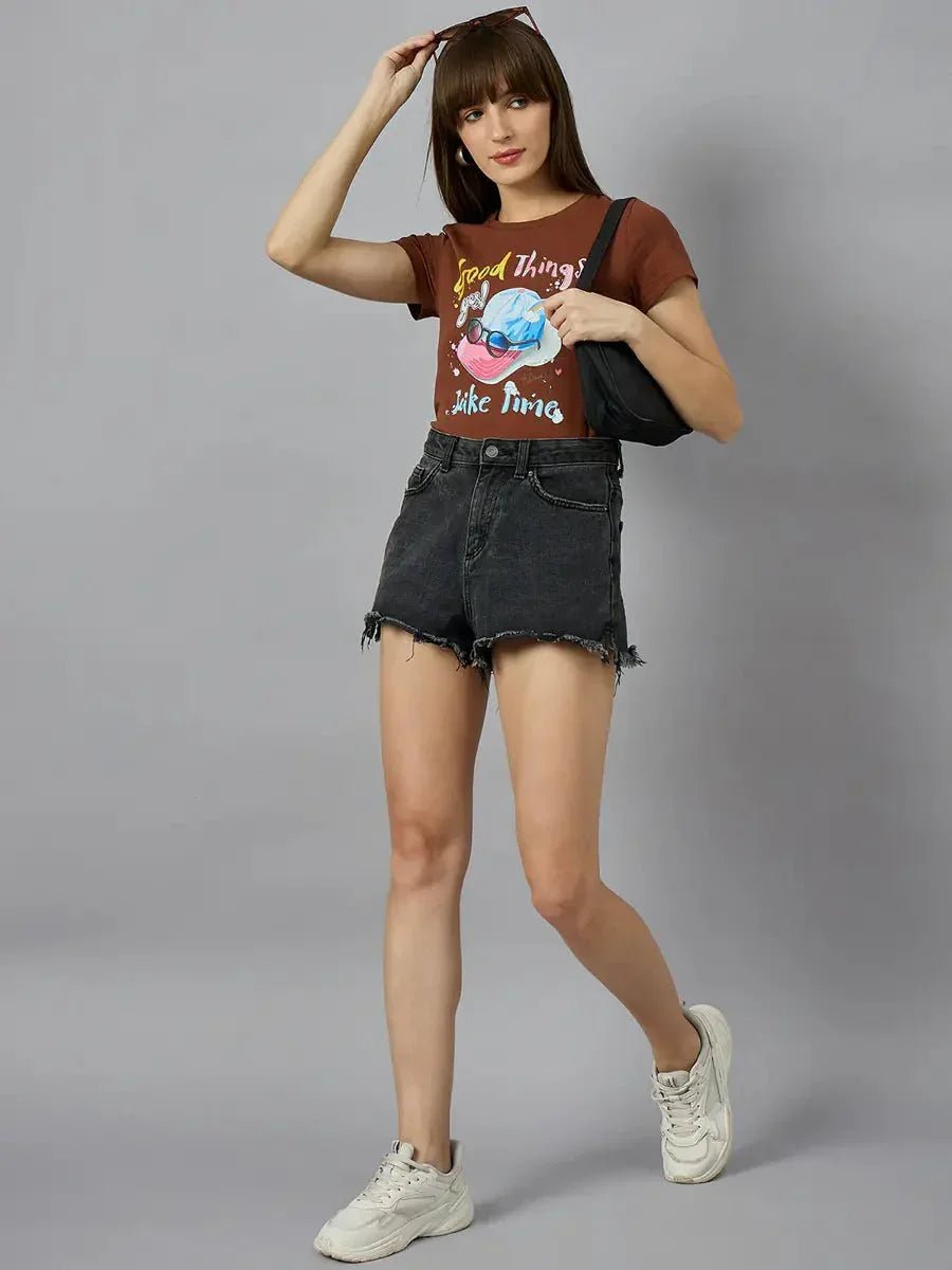 Woman in a 98degreenorth typography print cotton tee, perfect for chic streetwear-inspired everyday style.