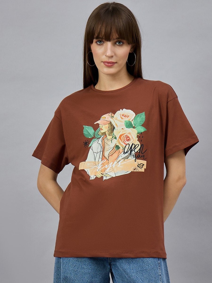 Woman in a 98degreenorth Casual Typography Print Cotton T-shirt, styled with blue jeans for an easy streetwear look.