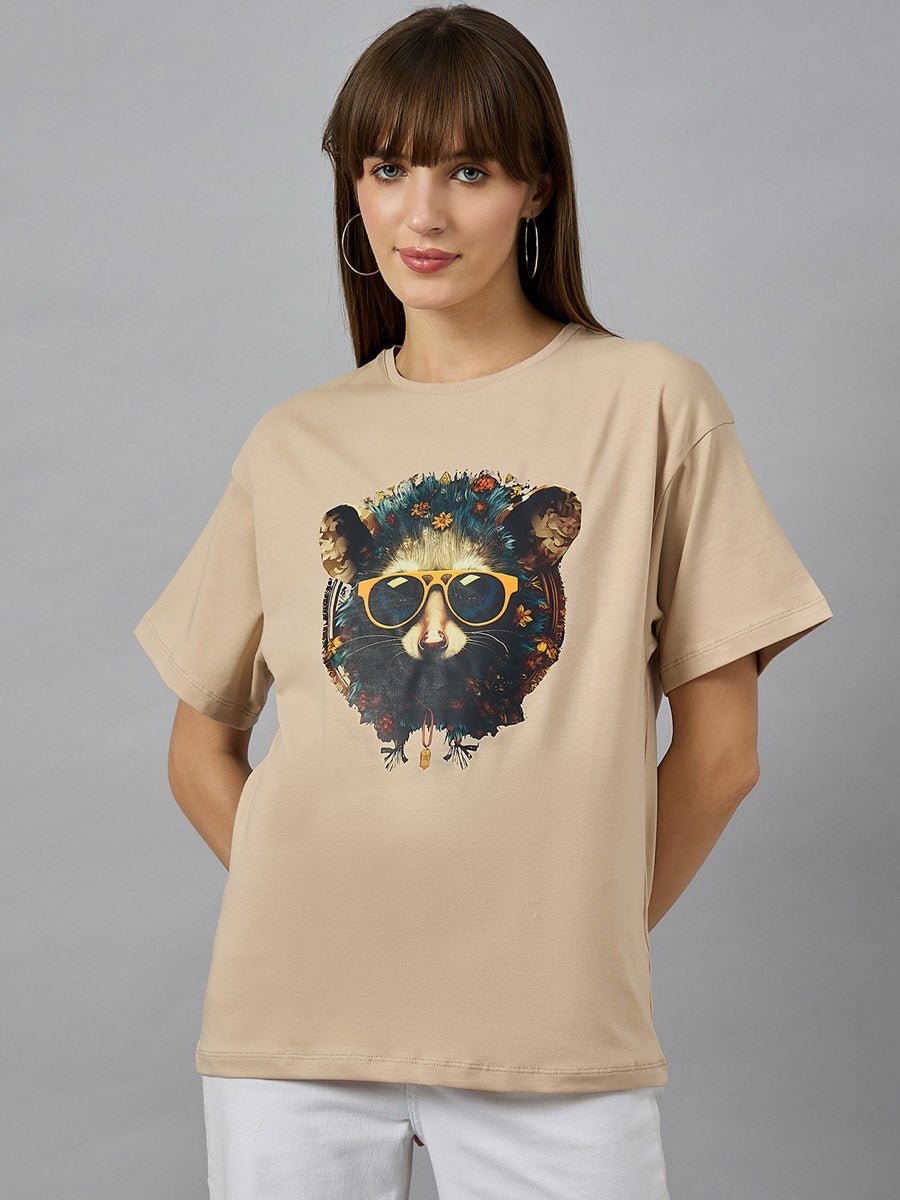 Woman in 98degreenorths Trendy Typography Oversized Cotton T-shirt, styled for streetwear against a gray background.