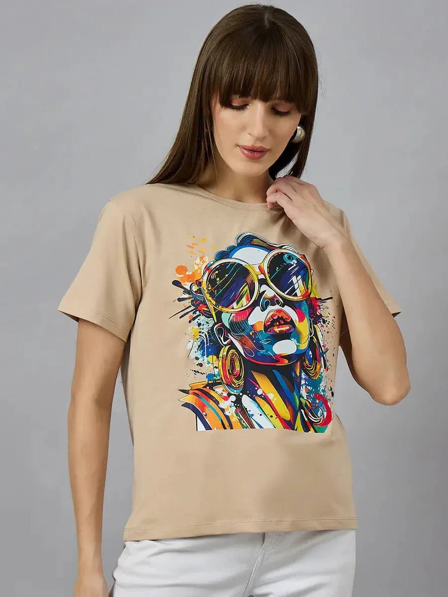 Woman wears 98degreenorth Typography Print Women’s Cotton T-shirt, relaxed fit, against a plain background.