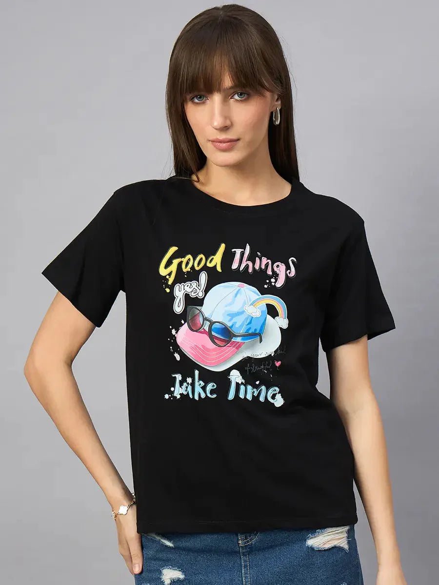 Woman in a 98degreenorth Women’s Typography Printed Cotton Tee—comfortable streetwear, cat graphic, “Good Things Take Time.”.