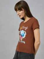 Woman in a 98degreenorth breathable cotton tee with typography print, perfect for streetwear-inspired everyday outfits.