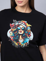 Woman wears the 98degreenorth Black Typography Printed Cotton T-shirt, an oversized streetwear must-have.