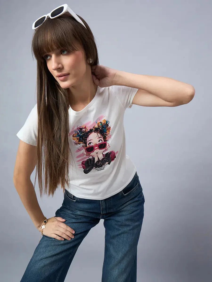 Woman wears the 98degreenorth typography cotton tee, perfect for streetwear, posing with sunglasses on her head.