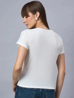 Woman with long brown hair in a 98degreenorth typography cotton tee, facing away against a gray background.