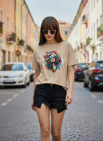 A woman in sunglasses and a 98degreenorth Casual Cotton Typography T-shirt strolls a colorful city street.