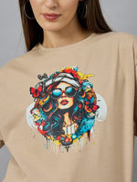 Woman in a 98degreenorth cotton round neck T-shirt with drop shoulders and a bold typography print.