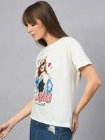 Woman in a 98degreenorth Casual Streetwear Cotton Typography T-shirt and denim skirt, against a gray background.