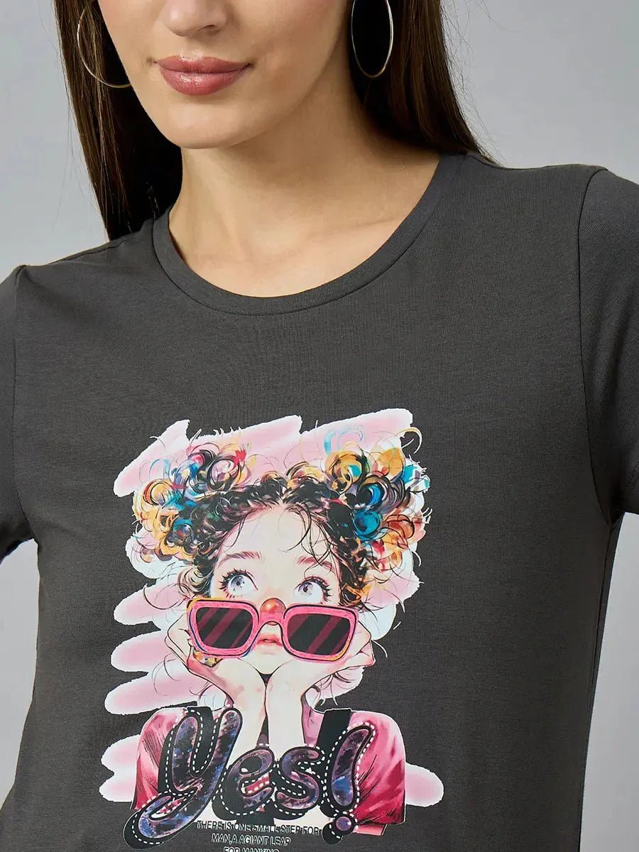 Woman in hoop earrings wears 98degreenorth’s classic cotton round-neck typography t-shirt for casual fashion.