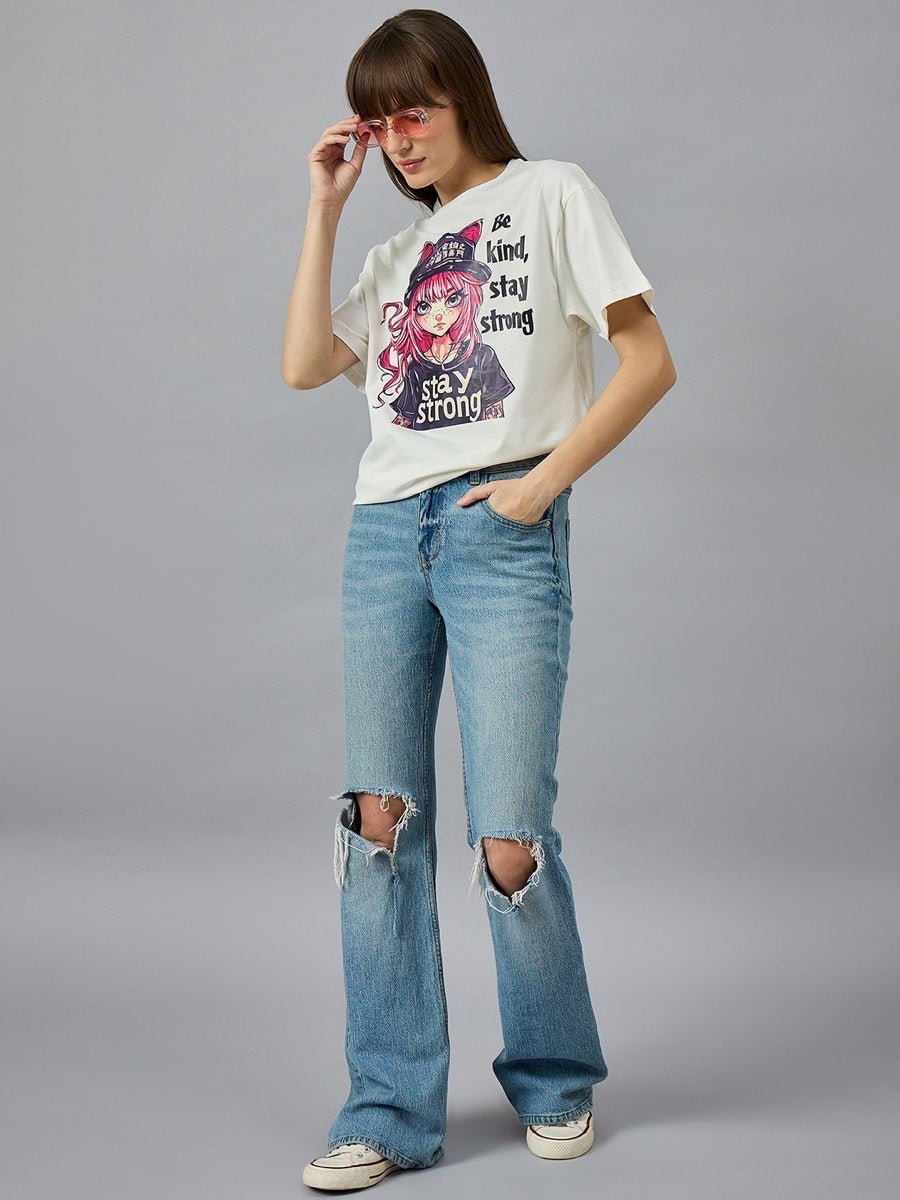 Woman wearing 98degreenorth Everyday Cotton Typography Print Tee, pink sunglasses, ripped jeans, and sneakers.