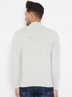 A man with short dark hair, seen from behind, wears the 98degreenorth Men Merino Wool Ecru Turtleneck Pullover and blue jeans against a plain white background.