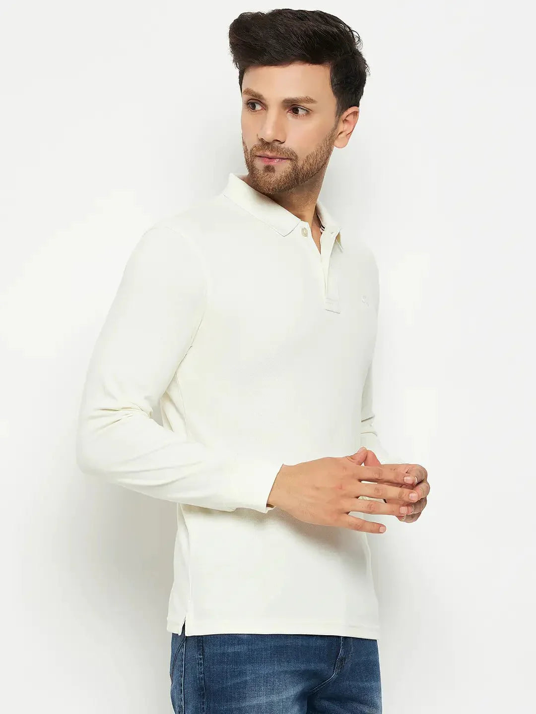 Man wears 98degreenorth Men Polo Collar Full Sleeves Butter T-shirt with blue jeans, against a plain white background.