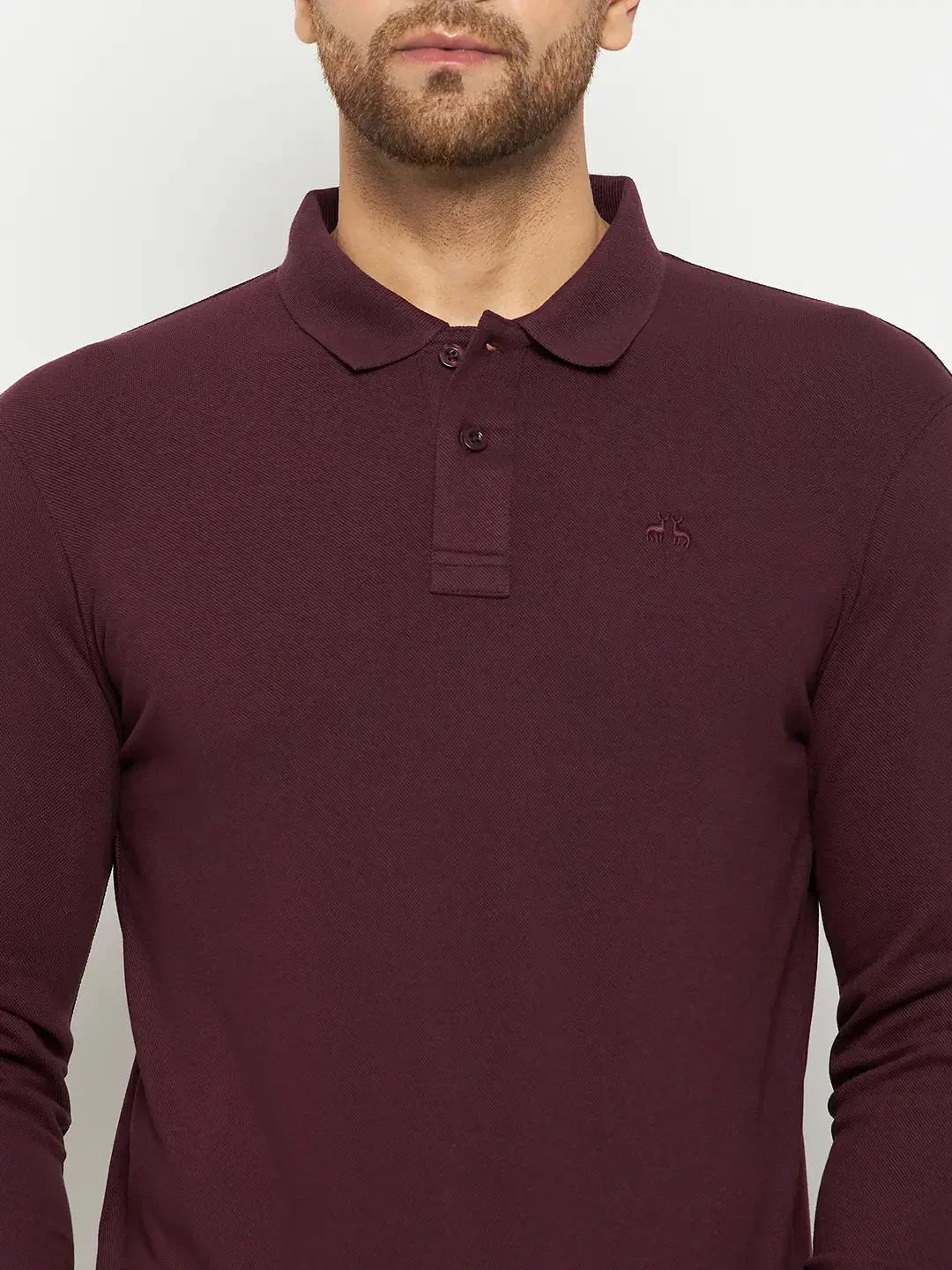 Man wearing a 98degreenorth Men Polo Collar Full Sleeves Dark Wine T-shirt, shown waist-up against a plain background.