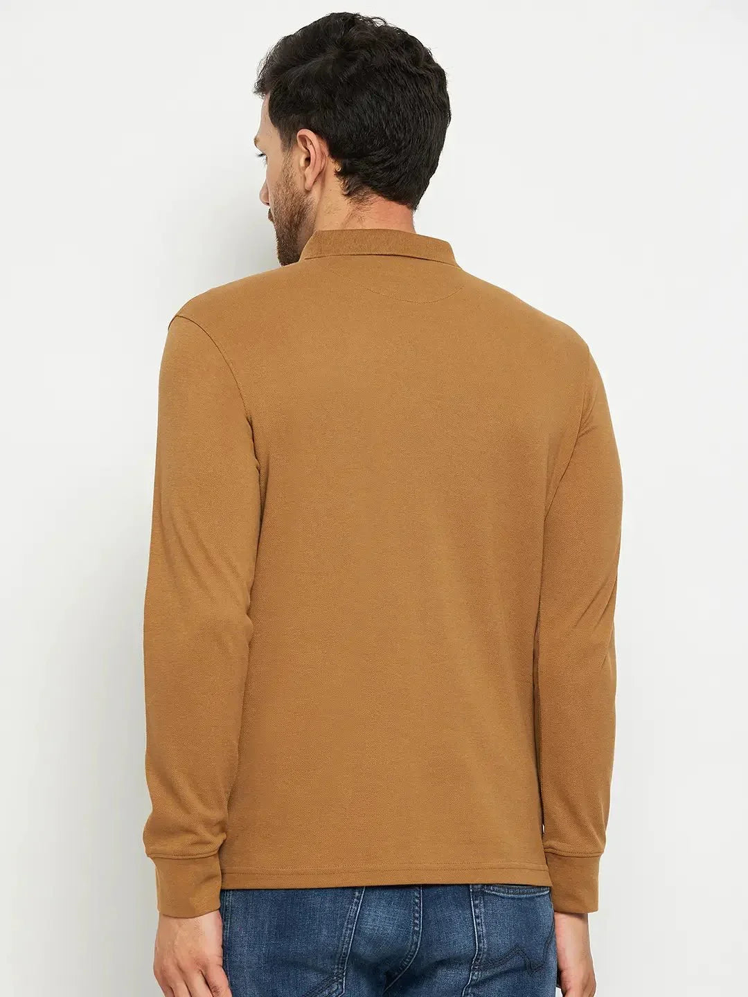 Man in 98degreenorth Men Polo Collar Full Sleeves Khakhi T-shirt, back to camera, plain background.