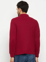 Man seen from behind in a 98degreenorth Men Polo Collar Full Sleeves Maroon T-shirt and blue jeans on white background.