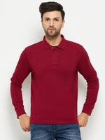Man wearing 98degreenorth Men Polo Collar Full Sleeves Maroon T-shirt and blue jeans, on a plain white background.