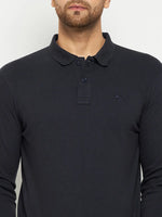 Man wears a 98degreenorth Men Polo Collar Full Sleeves Navy T-shirt, perfect for any travel wardrobe, against a plain background.