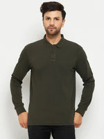 Man in an olive Men Polo Collar Full Sleeves T-shirt by 98degreenorth and black pants, on a plain white background.