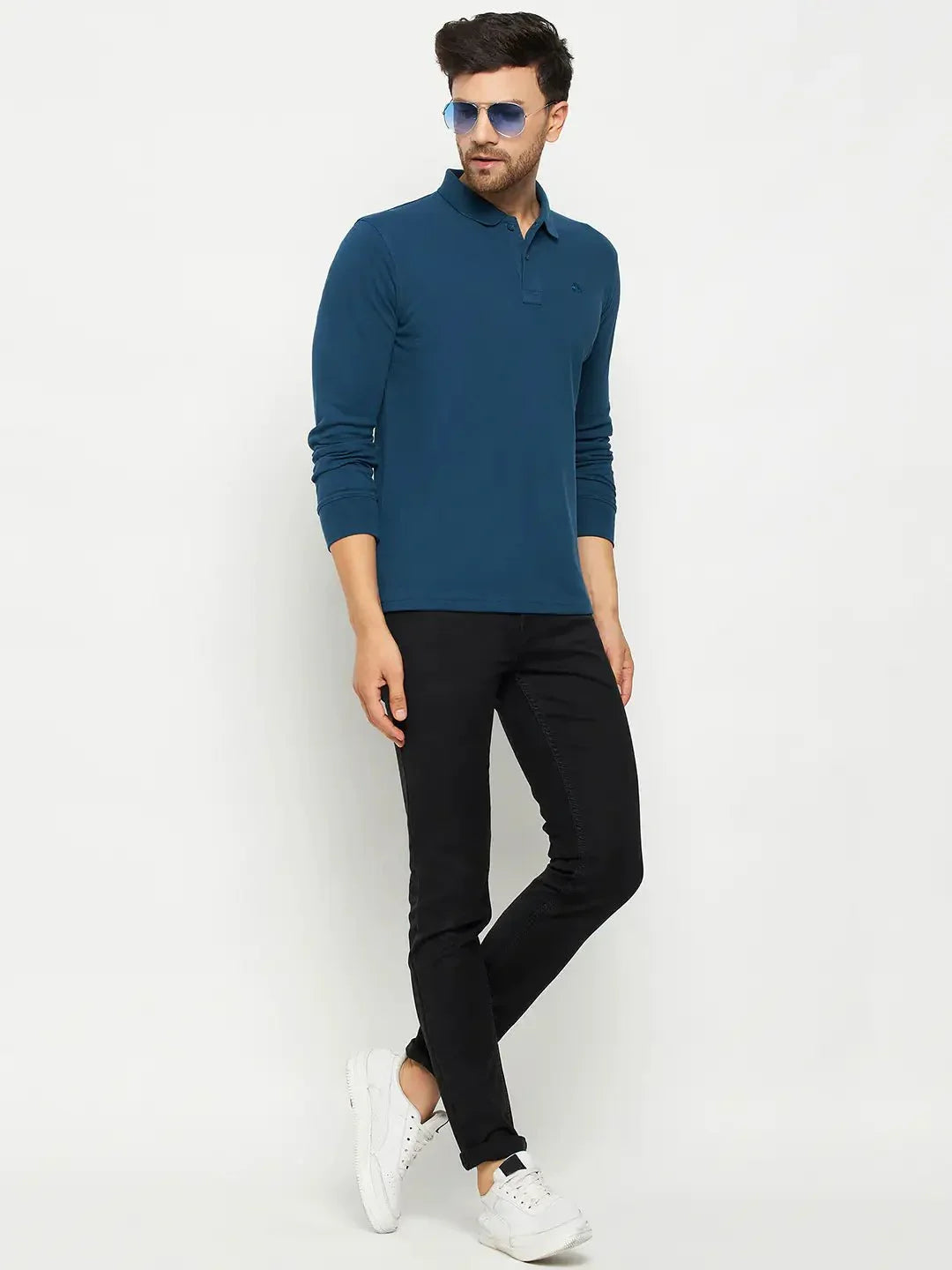 Man in 98degreenorth Men Polo Collar Full Sleeves Teal T-shirt stands against a white background.