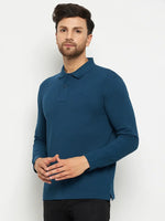 A man in a Men Polo Collar Full Sleeves Teal T-shirt by 98degreenorth and black pants stands against a white background.