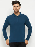 Man wears 98degreenorth Men Polo Collar Full Sleeves Teal T-shirt with black pants, against a white background.