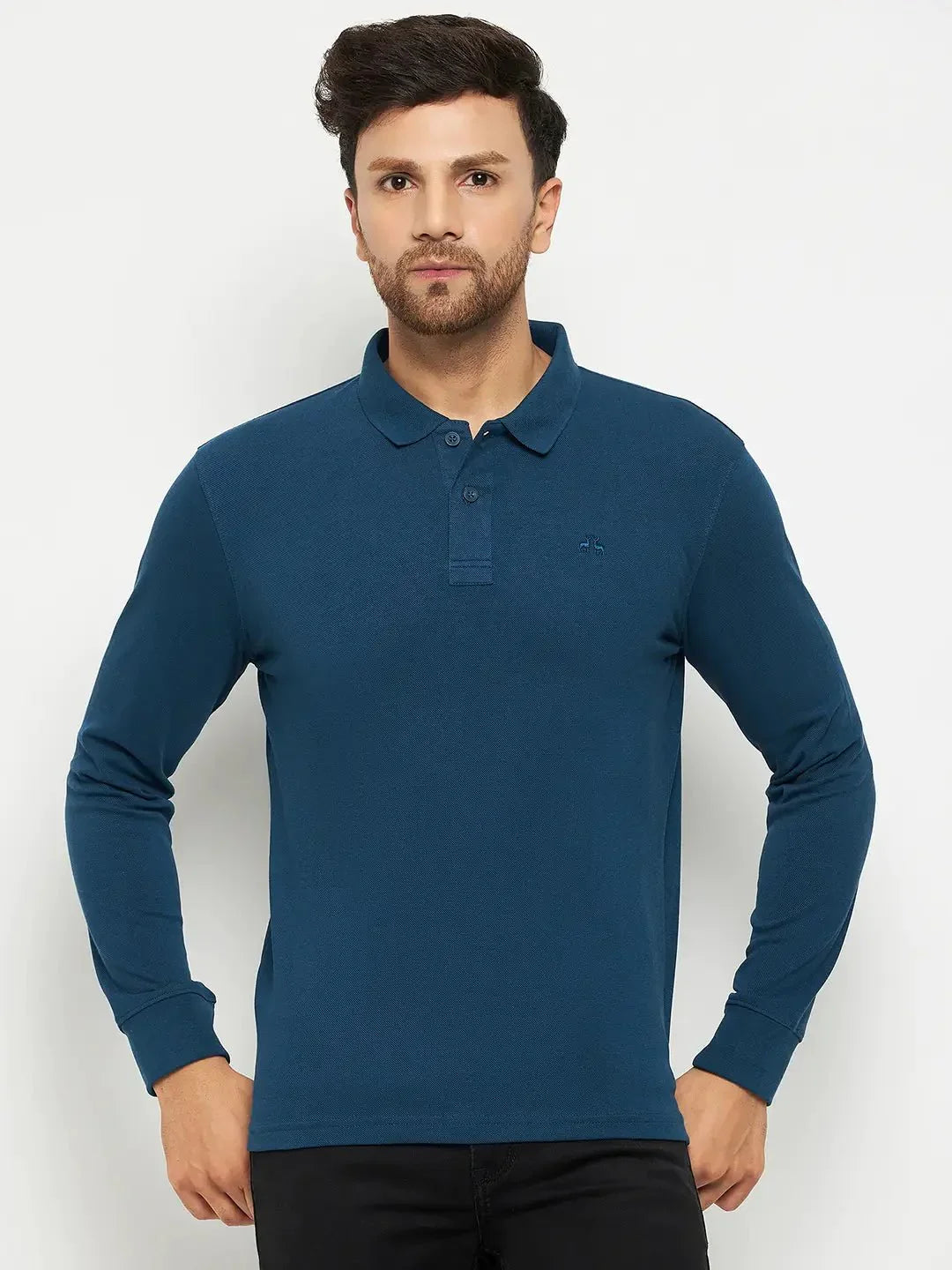 Man wears 98degreenorth Men Polo Collar Full Sleeves Teal T-shirt with black pants, against a white background.