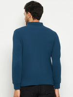 Man wearing 98degreenorth Men Polo Collar Full Sleeves Teal T-shirt, facing away against a plain light background.