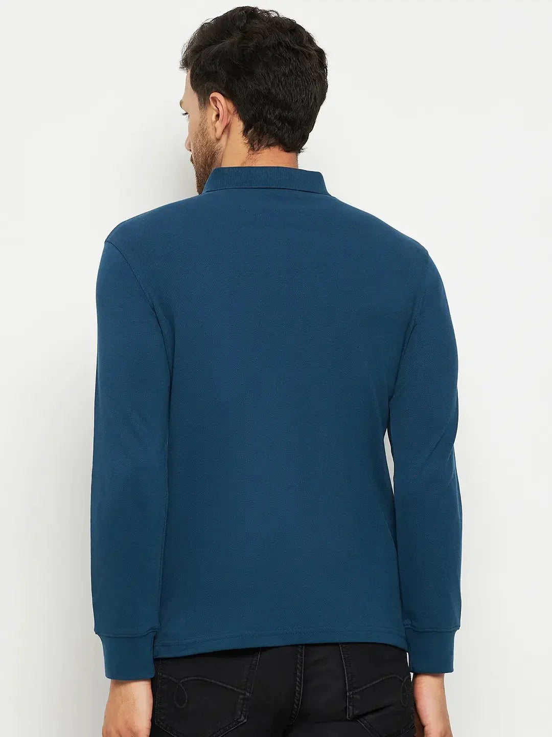 Man wearing 98degreenorth Men Polo Collar Full Sleeves Teal T-shirt, facing away against a plain light background.