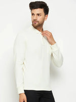 Man wears 98degreenorth Men Polo Collar Full Sleeves With Pocket Butter T-shirt with black pants on a white background.