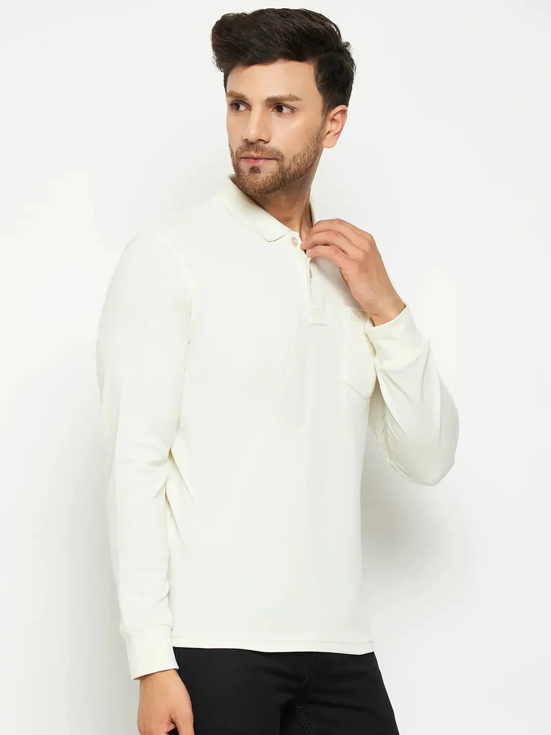 Man wears 98degreenorth Men Polo Collar Full Sleeves With Pocket Butter T-shirt with black pants on a white background.