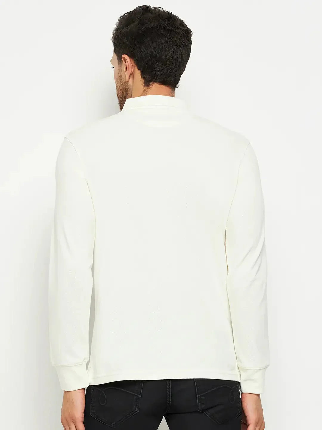 Man in a 98degreenorth Men Polo Collar Full Sleeves With Pocket Butter T-shirt and black pants, facing away.