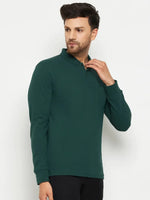 Man in a 98degreenorth Men Polo Collar Full Sleeves Dark Green T-shirt with pocket, against a plain background.