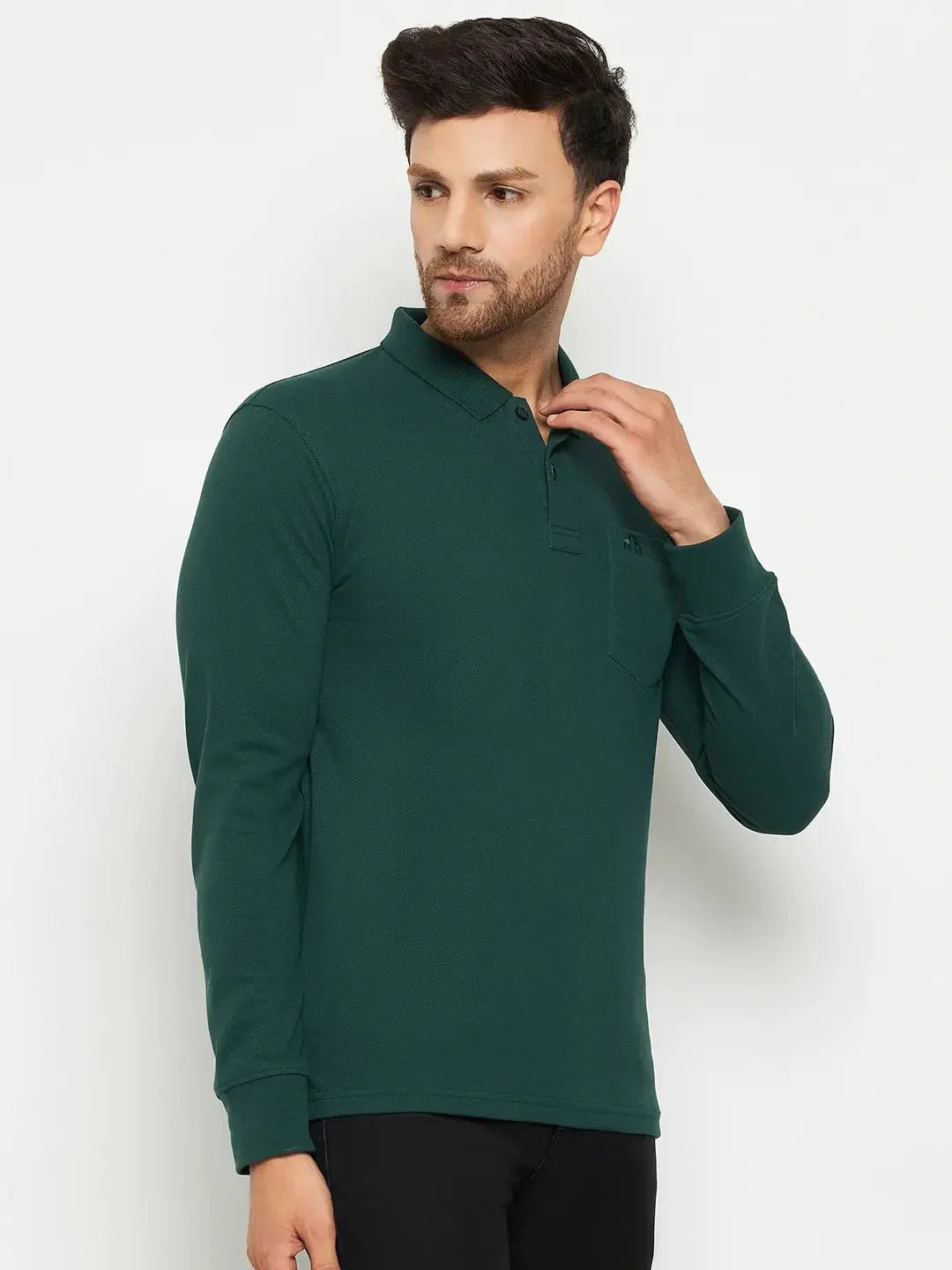 Man in a 98degreenorth Men Polo Collar Full Sleeves Dark Green T-shirt with pocket, against a plain background.