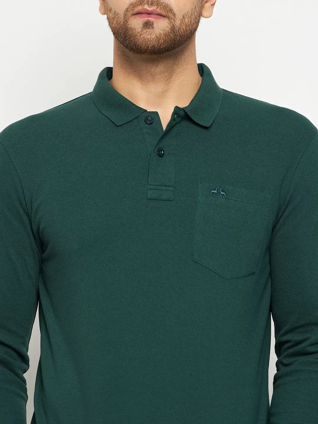 A man in a 98degreenorth Men Polo Collar Full Sleeves With Pocket Dark Green T-shirt with embroidered logo.