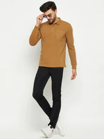 Man in a 98degreenorth Men Polo Collar Full Sleeves With Pocket Khakhi T-shirt, black pants, and sunglasses.