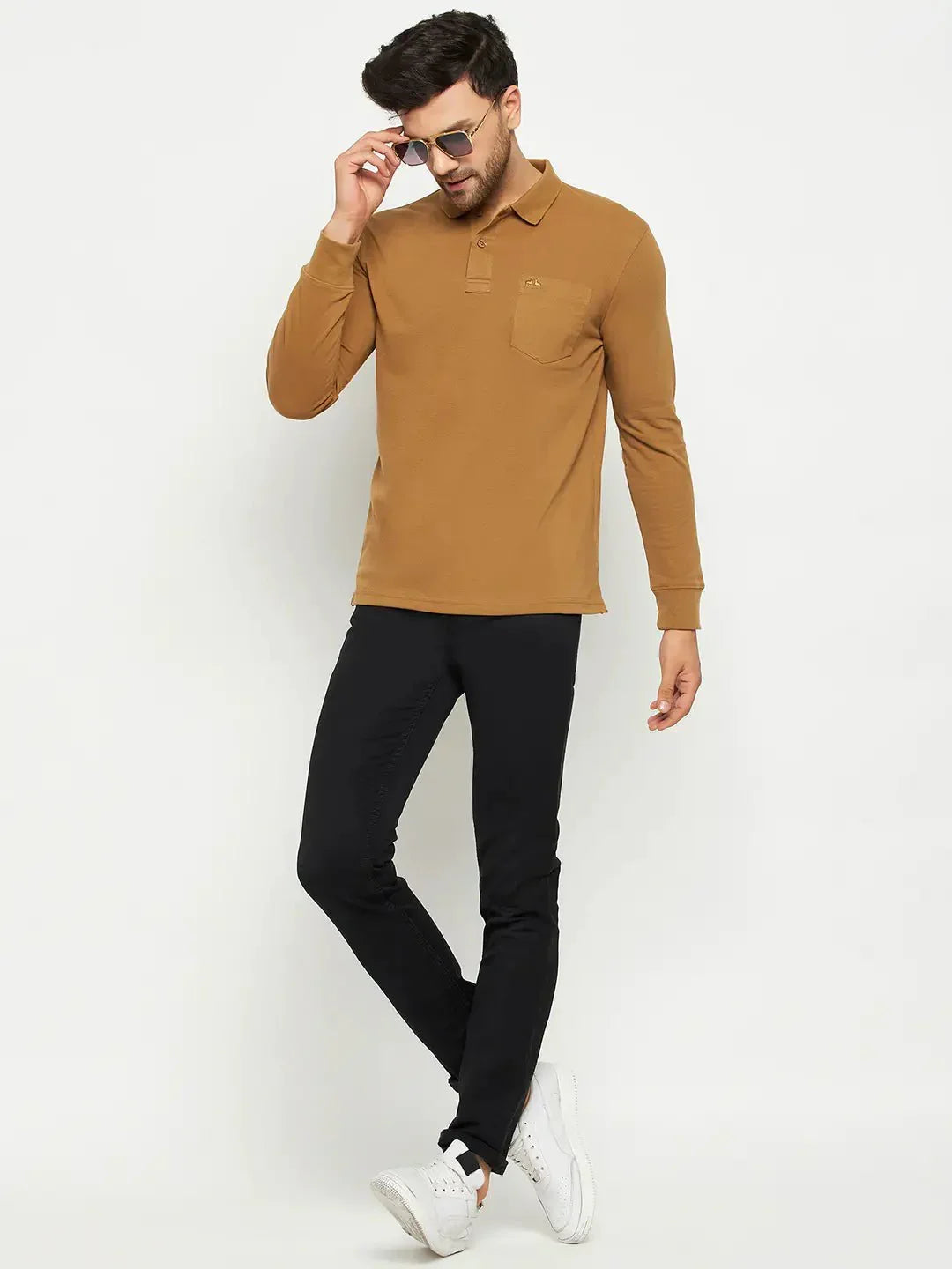 Man in a 98degreenorth Men Polo Collar Full Sleeves With Pocket Khakhi T-shirt, black pants, and sunglasses.