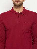 Man in 98degreenorth Men Polo Collar Full Sleeves With Pocket Maroon T-shirt—ideal for travel.