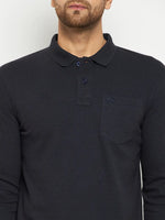 A man models the 98degreenorth Men Polo Collar Full Sleeves With Pocket Navy T-shirt, shown shoulders to mid-torso.