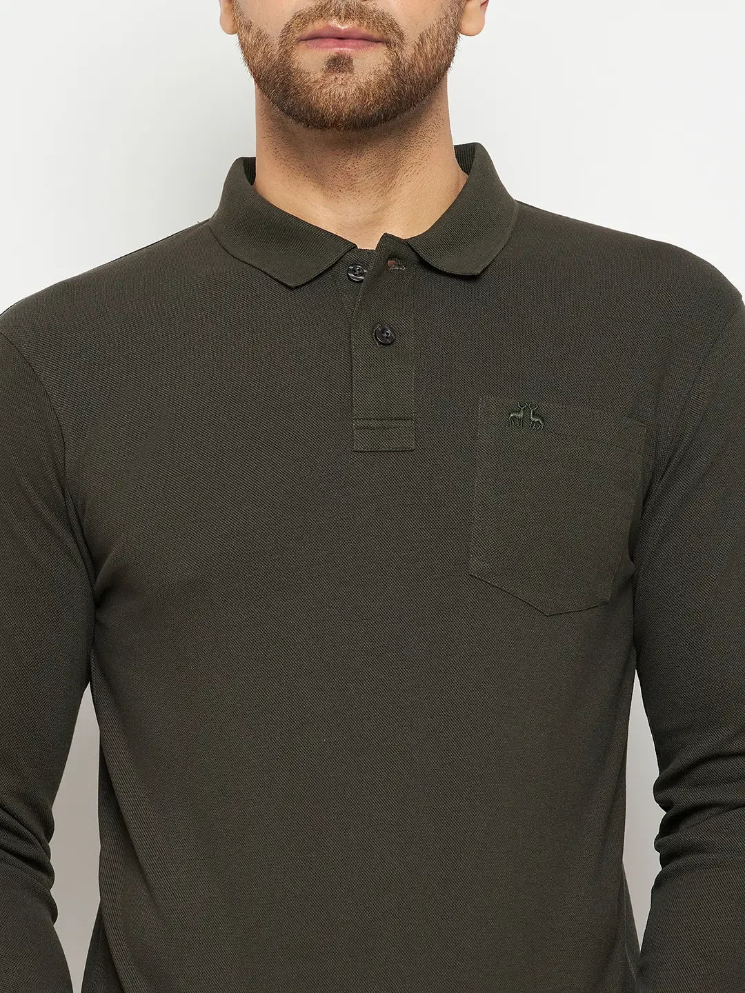 A man wears a 98degreenorth Men Polo Collar Full Sleeves With Pocket T-shirt in olive, shown shoulders to waist.
