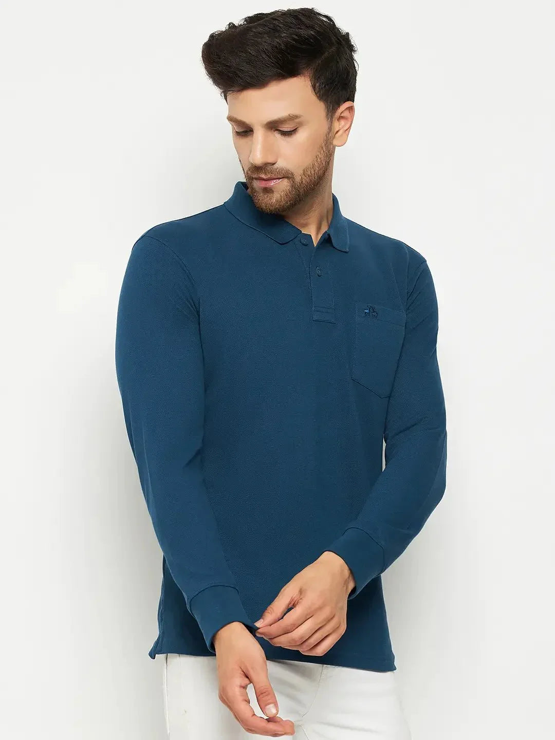 Man wears 98degreenorth Men Polo Collar Full Sleeves With Pocket Teal T-shirt, made from premium cotton blend.