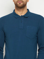 Man wearing a 98degreenorth Men Polo Collar Full Sleeves With Pocket Teal T-shirt, against a plain background.