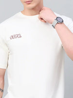 Man in 98degreenorth Men Typography Oversized Offwhite Printed Round Neck T-shirt, watch on wrist, neutral background.