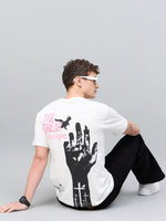 Person in sunglasses wears a 98degreenorth Men Typography Printed Offwhite Round Neck T-shirt with graphic back print.
