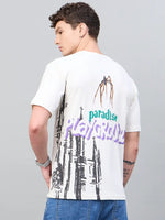 Man in a 98degreenorth Men Typography Printed Round Neck Offwhite T-shirt, standing sideways.