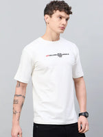 A man in an offwhite 98degreenorth Men Typography Printed Round Neck T-shirt stands against a gray background.