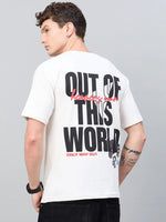 Man in a 98degreenorth Men Typography Printed Round Neck T-shirt with bold black and red OUT OF THIS WORLD text on back.