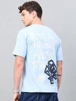 Man models the 98degreenorth Men Typography Printed Sky Round Neck T-shirt, showing its bold back graphic.