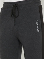 Close-up of Men’s Anthra Fleece Trackpants with Side Stripe by 98degreenorth—warm joggers with a black drawstring.