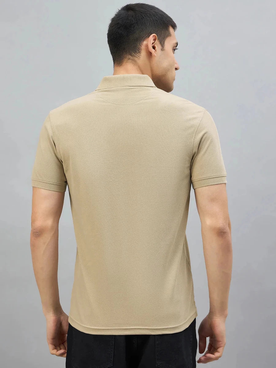 Man in 98degreenorth Men's Beige Aero Club No.3 Polo T-Shirt, back view, against a plain gray background.