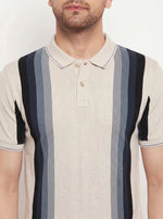 A man wears the 98degreenorth Men's Beige Vertical Striped Polo T-Shirt, shown from shoulders to lips.